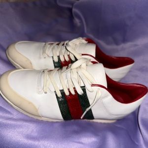 GUCCI sneakers , very old. Worn ! Idk when I got them lol authentic. Size 11